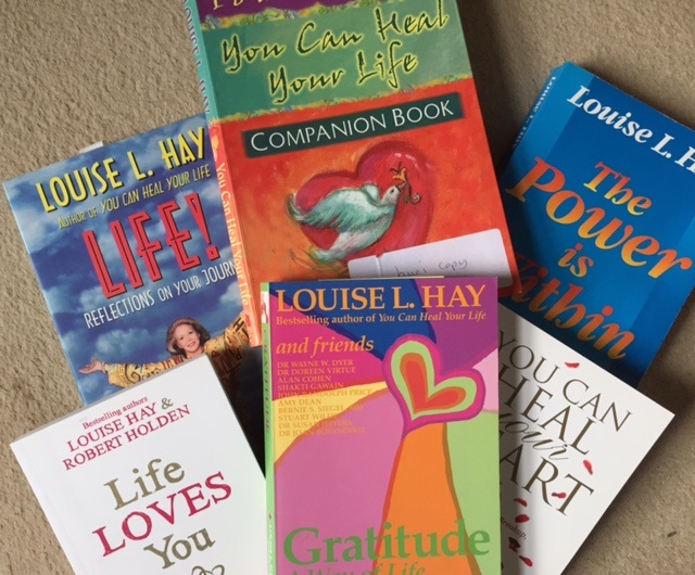 a selection of books by Louise Hay