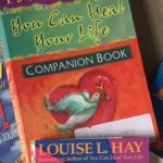 a selection of books by Louise Hay